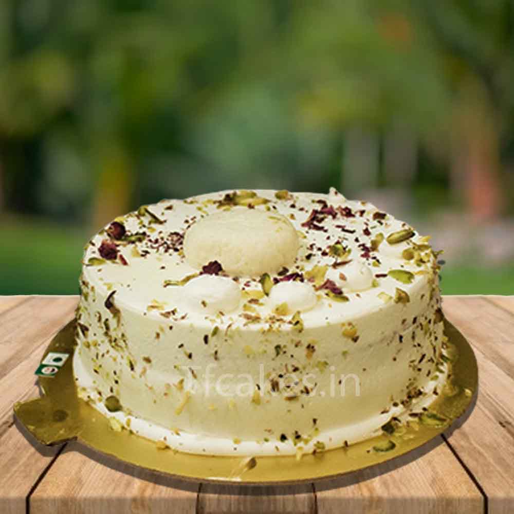 Rasmalai cake with topping pista