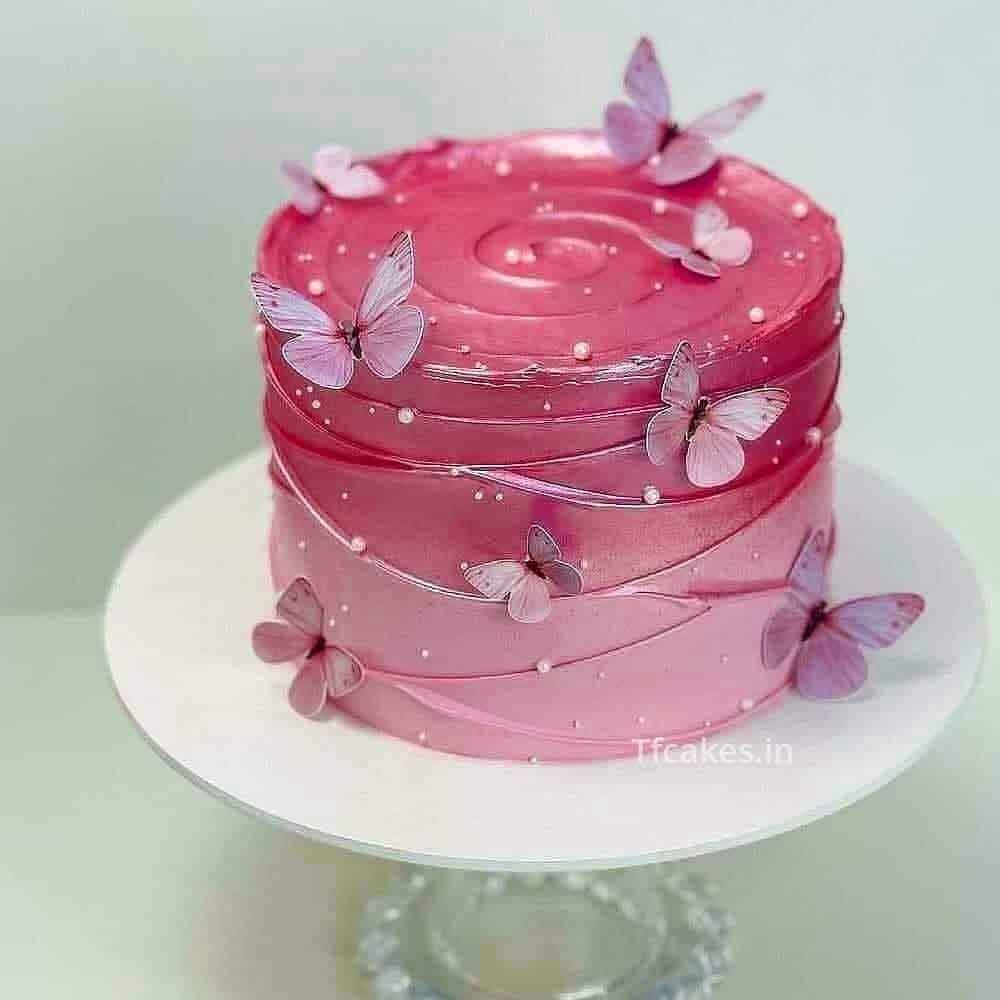 Pink buttercream cake with white chocolate drip, donuts and waffle con –  Get Caked by Lisa