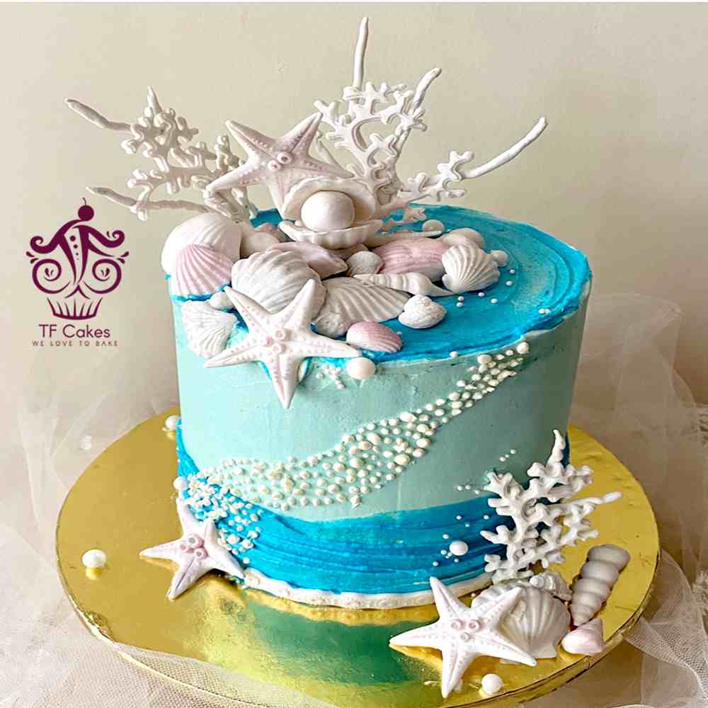 Starry Seashell Spectacle Cake